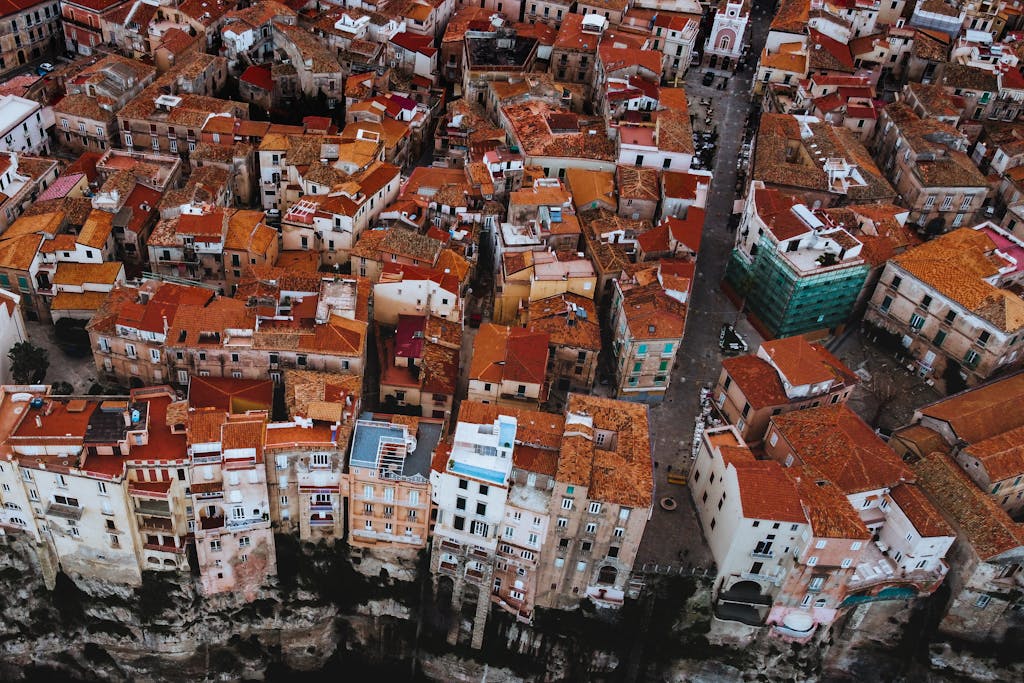 Aerial Photography of Brown and White Concrete Buildings
