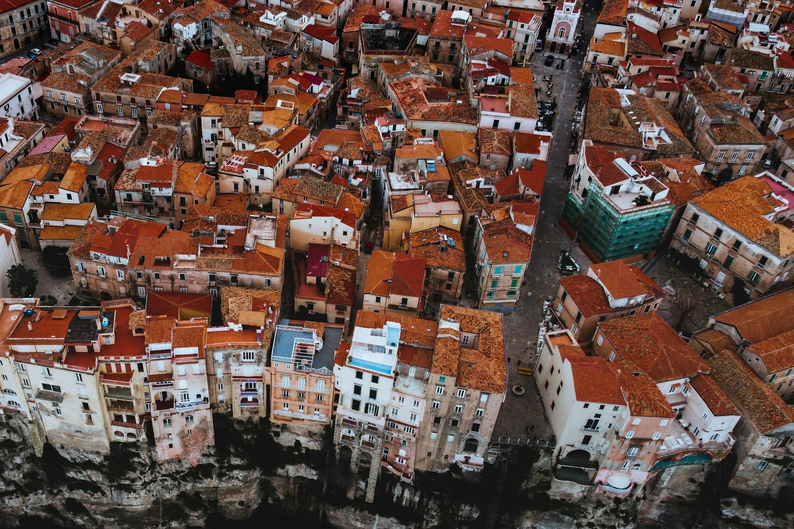 Aerial Photography of Brown and White Concrete Buildings